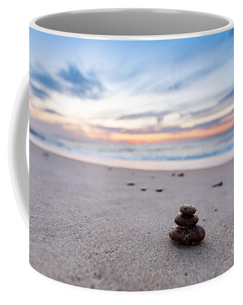 Zen Coffee Mug featuring the photograph Zen stones on calm beach at sunset by Michal Bednarek