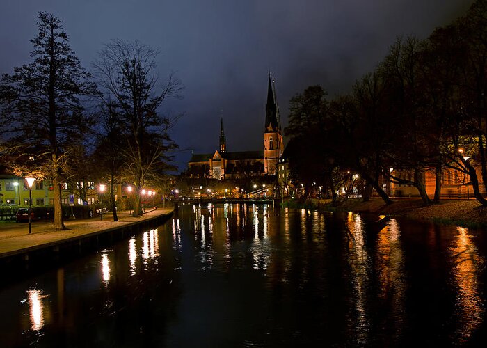 Uppsala By Night Greeting Card featuring the photograph Uppsala by night by Torbjorn Swenelius