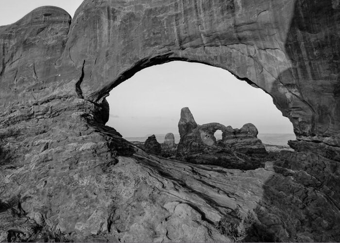 America Greeting Card featuring the photograph Wide Angle of Turret Arch through the North Window in Black and White by Gregory Ballos