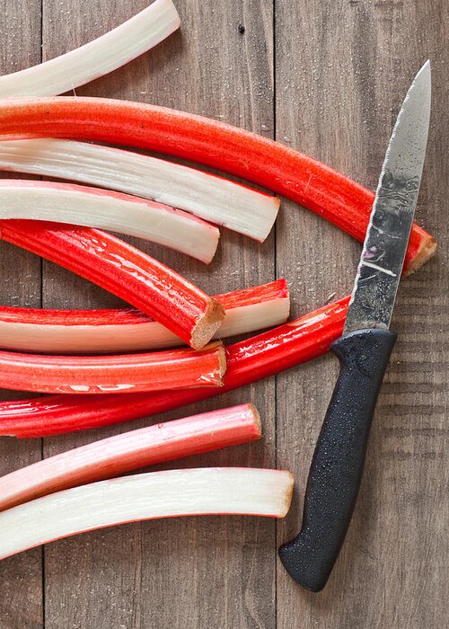 Background Greeting Card featuring the photograph Cutting rhubarb #2 by Tom Gowanlock