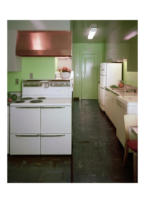 Indoors Greeting Card featuring the photograph A Green Kitchen by Constantin Joffe