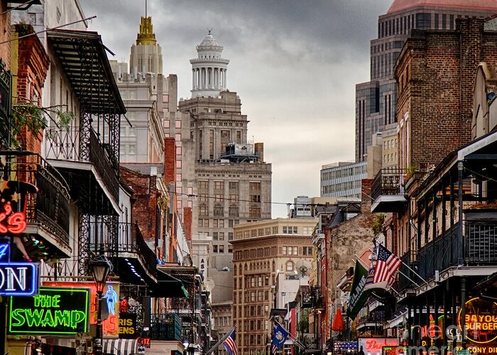 New Orleans Greeting Card featuring the photograph A view down Bourbon Street by Jarrod Erbe