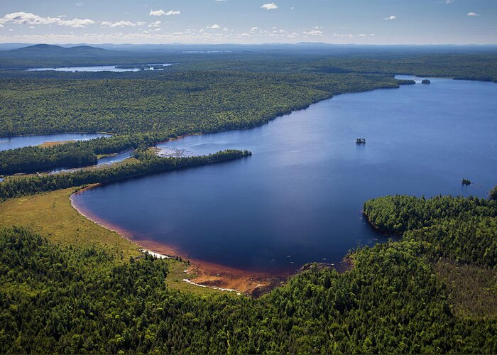 Tranquility Greeting Card featuring the photograph Aerial Of Lake And Lush Forest In Maine by Justin Lewis