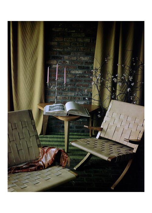 Nobody Greeting Card featuring the photograph An Armchair Beside A Table And An Old Book by Horst P. Horst