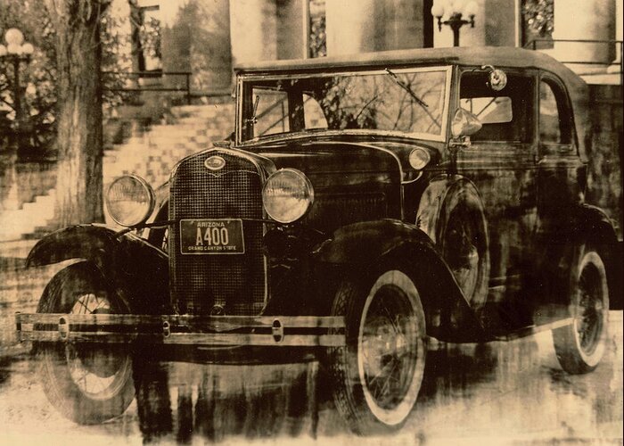 Antique Care Greeting Card featuring the photograph Antique car by James Bethanis