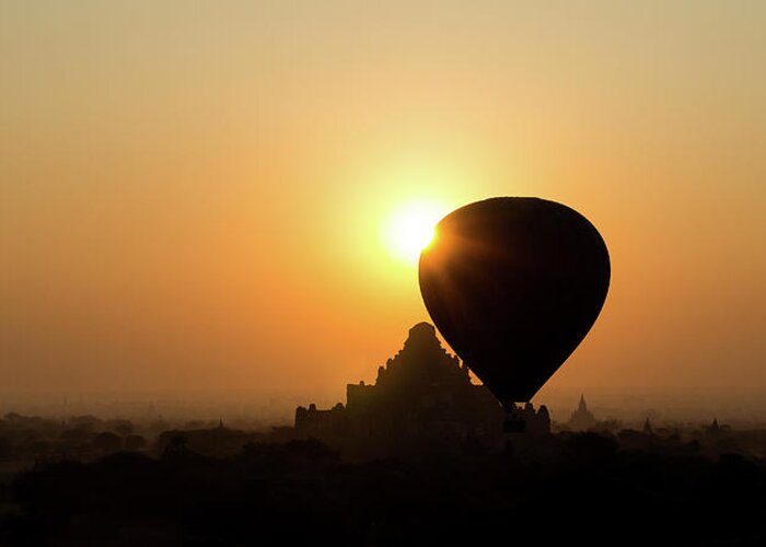 Tranquility Greeting Card featuring the photograph Balloon At Sunrise In Bagan by Damien Polegato