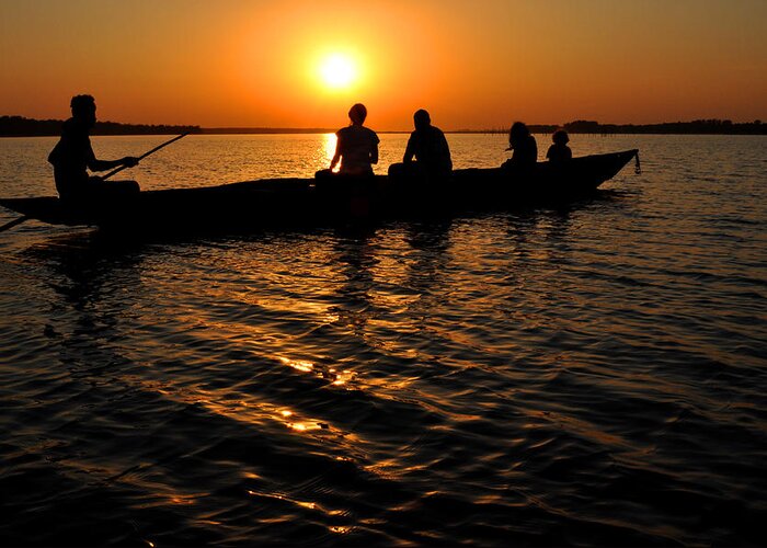 India Greeting Card featuring the photograph Boat in sunset on Chilika Lake India by Diane Lent