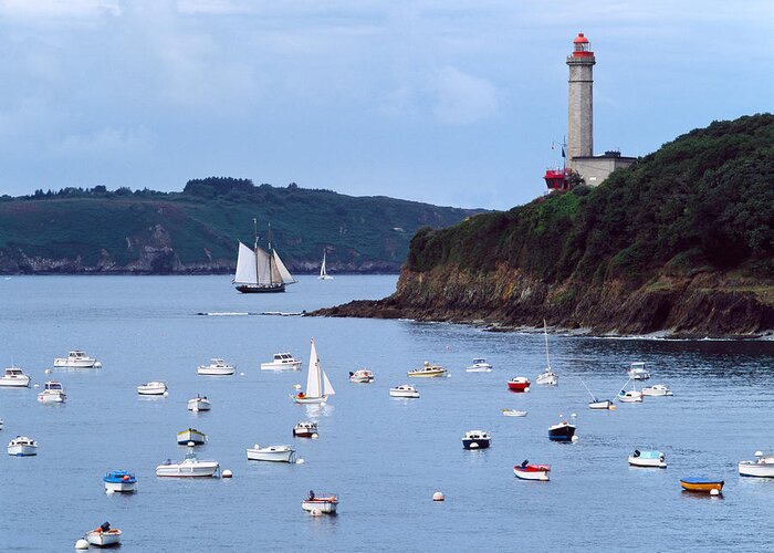 Photography Greeting Card featuring the photograph Boats And Lighthouse At Phare Du by Panoramic Images