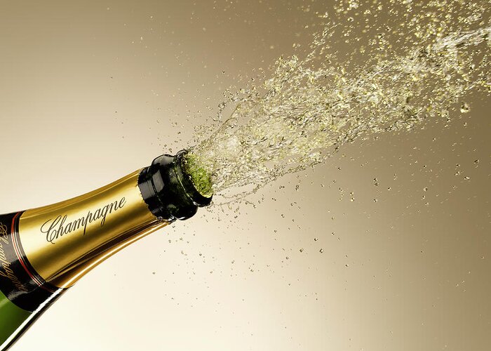 Celebration Greeting Card featuring the photograph Champagne Exploding From Bottle by Andy Roberts