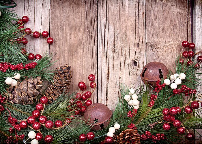 Background Greeting Card featuring the photograph Christmas berries on wooden background by Jennifer Huls