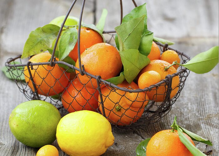 Large Group Of Objects Greeting Card featuring the photograph Citrus In A Basket by Julia Khusainova