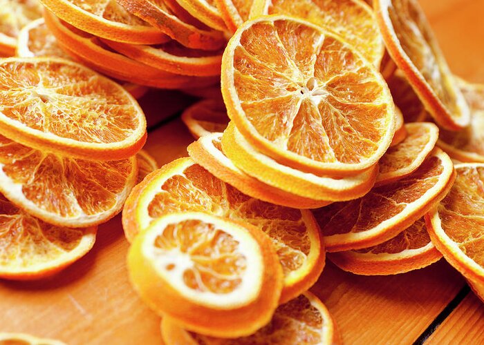 Orange Greeting Card featuring the photograph Close Up Of Dried Orange Slices by Nils Hendrik Mueller