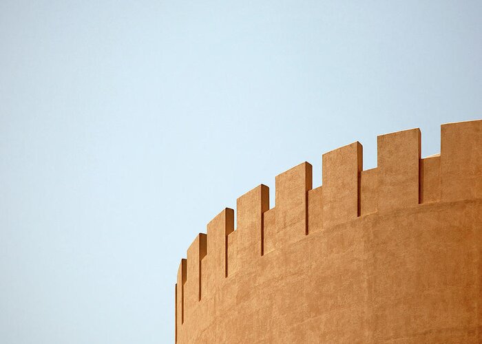 Curve Greeting Card featuring the photograph Curved Wall With Battlements, Dubai by Cultura Exclusive/alex Holland