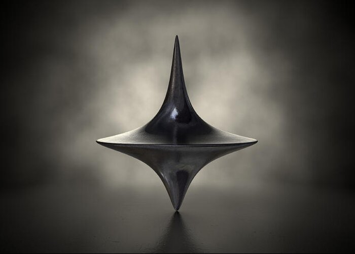 Top Greeting Card featuring the digital art Die Cast Spinning Top Silhouetted by Allan Swart