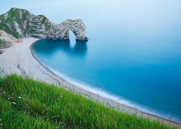 Durdle Greeting Card featuring the photograph Durdle Door in the evening by Ian Middleton