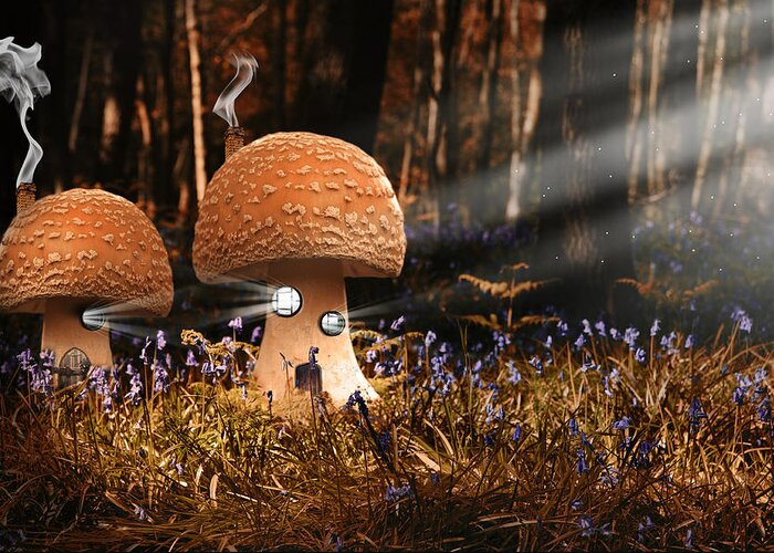 Fantasy Greeting Card featuring the photograph Fantasy image of toadstool houses in bluebell woods by Matthew Gibson