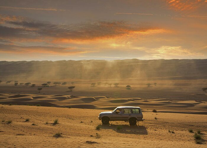 Dust Greeting Card featuring the photograph Four Wheel Driving In A Desert by Buena Vista Images