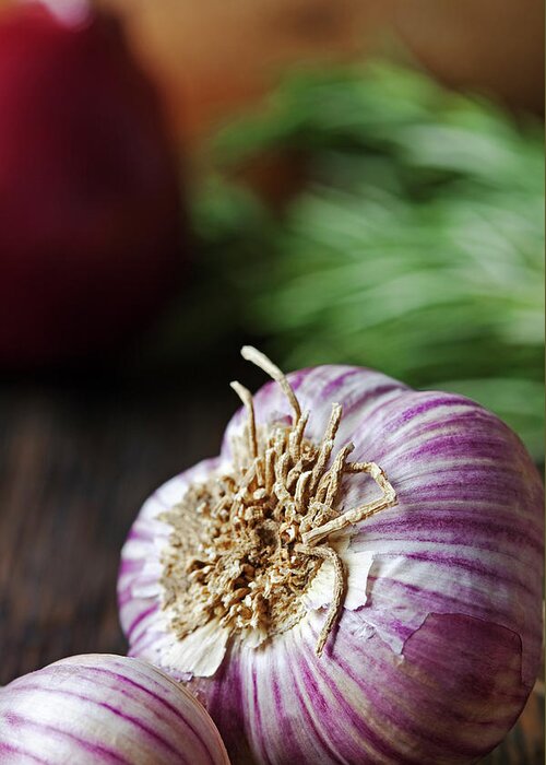 Wood Greeting Card featuring the photograph Garlic And Vegetables On A Rustic by John W Banagan
