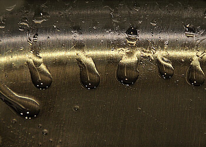 Metallic Greeting Card featuring the photograph Golden Droplets by Geraldine Alexander
