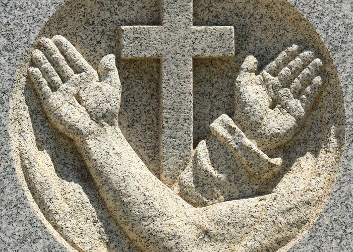 Stone Cross Greeting Card featuring the photograph Hands And The Cross by Adam Jewell