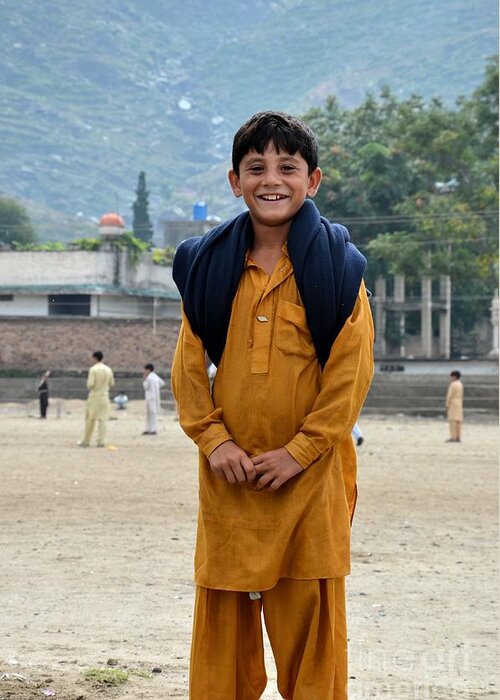 Boy Greeting Card featuring the photograph Happy laughing Pathan boy in Swat Valley Pakistan by Imran Ahmed