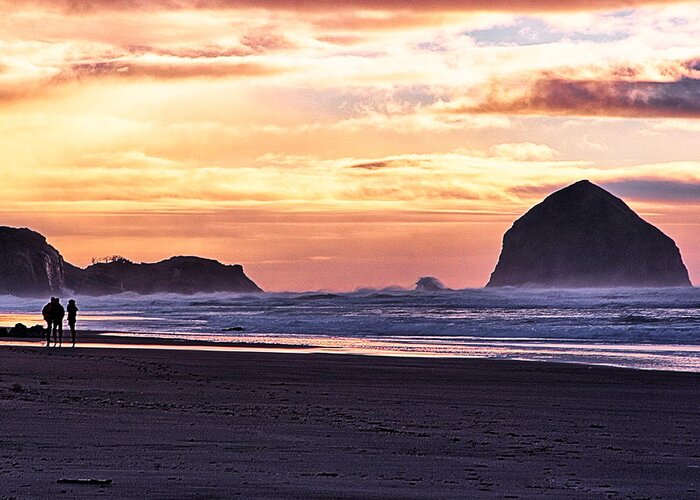 Haystack Rock Greeting Card featuring the photograph Haystack Rock Beach Walk Sunset by Chriss Pagani