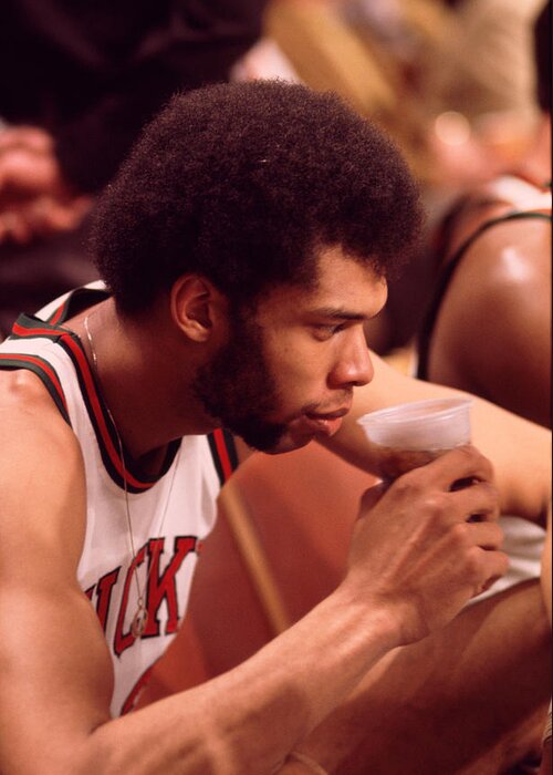 Marvin Newman Greeting Card featuring the photograph Kareem Abdul Jabbar Takes A Drink by Retro Images Archive