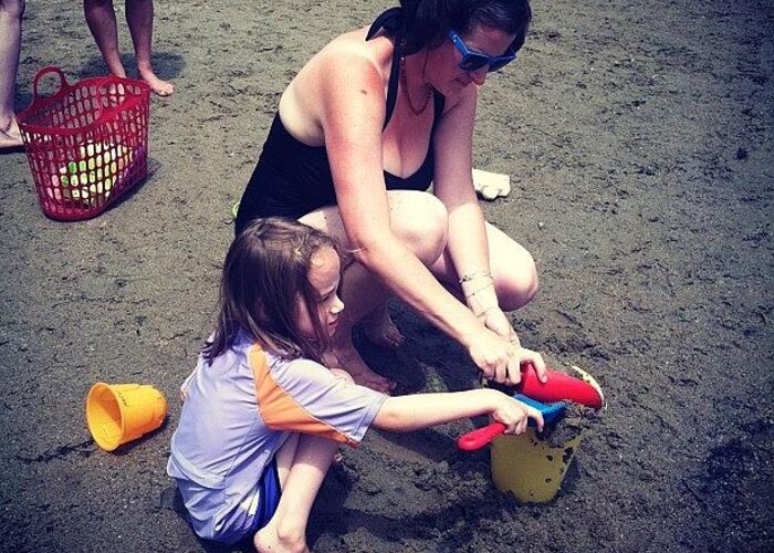  Greeting Card featuring the photograph Lilly Building Sand Castles With Mommy by Allison Clayton