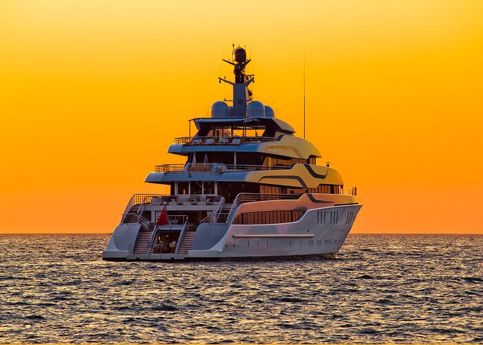 Vessel Greeting Card featuring the photograph Luxury yacht on open sea at sunset by Brch Photography