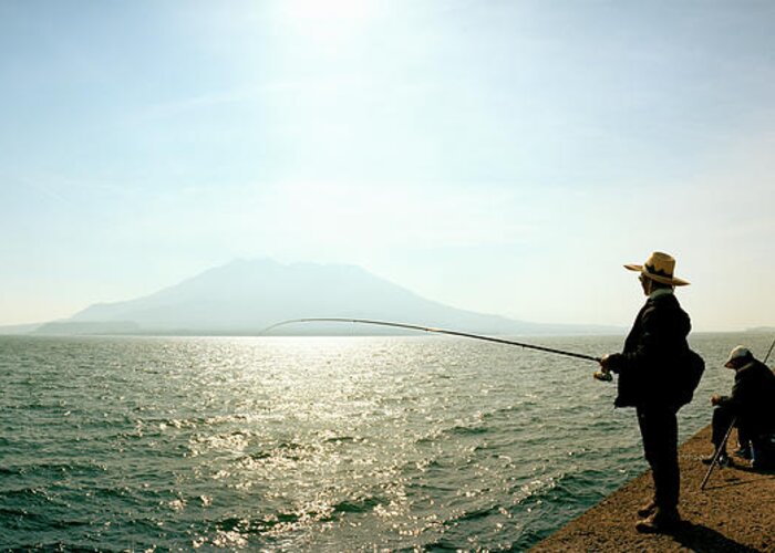 Photography Greeting Card featuring the photograph Men Fishing In Sakurajima Island by Panoramic Images