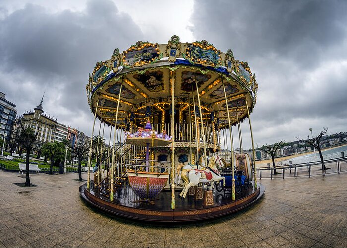 Merry Greeting Card featuring the photograph Merry-go-Round by Pablo Lopez