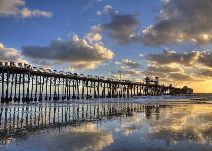 California Greeting Card featuring the photograph Oceanside Pier Sunset Reflection by Peter Tellone