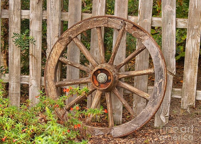 Wooden Wagon Wheel Greeting Card featuring the photograph Old Spare Wheel by Chris Thaxter
