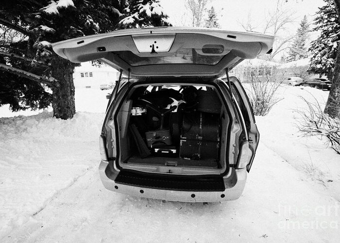 Snow Greeting Card featuring the photograph packing musicians equipment into mpv vehicle in Regina Saskatchewan Canada by Joe Fox
