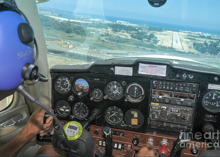 Pilot Greeting Card featuring the photograph Pilot in Cessna cockpit by Shay Levy