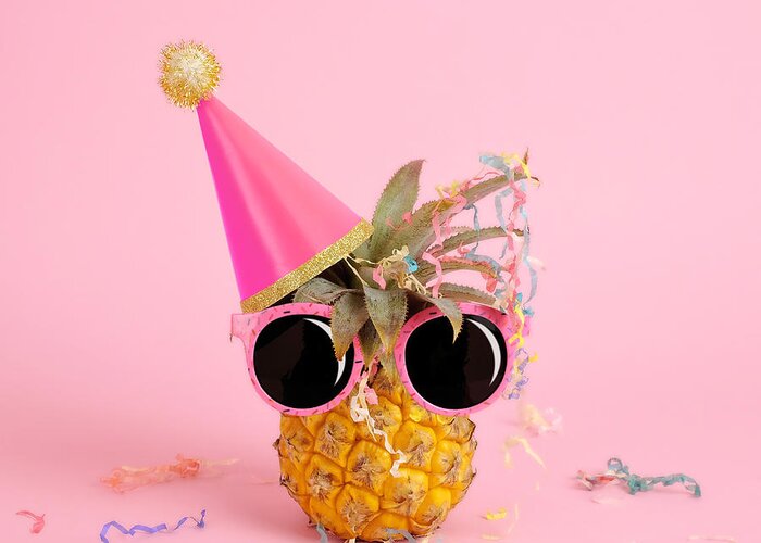 Celebration Greeting Card featuring the photograph Pineapple Wearing A Party Hat And by Juj Winn