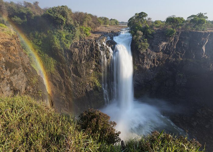 Vincent Grafhorst Greeting Card featuring the photograph Rainbow In The Mist Of Victoria Falls by Vincent Grafhorst