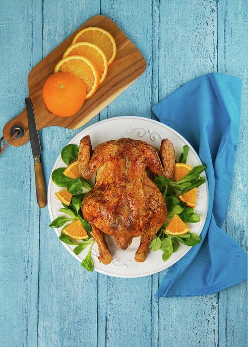 Orange Greeting Card featuring the photograph Roasted Chicken by Sashahaltam