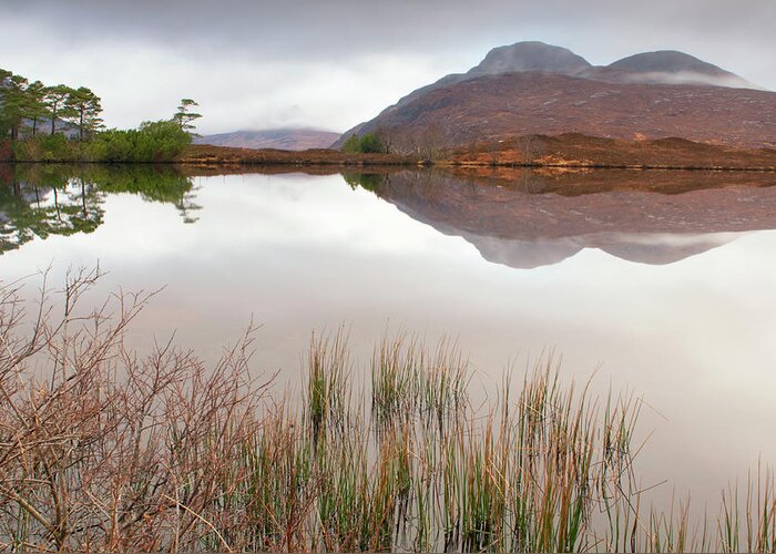 Water's Edge Greeting Card featuring the photograph Scottish Loch In The Early Morning by Nkbimages