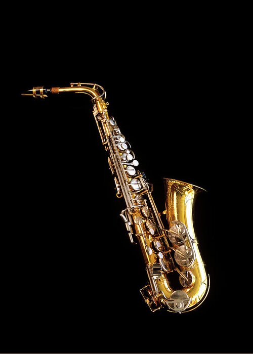 Photography Greeting Card featuring the photograph Single Saxophone Against Black by Vintage Images