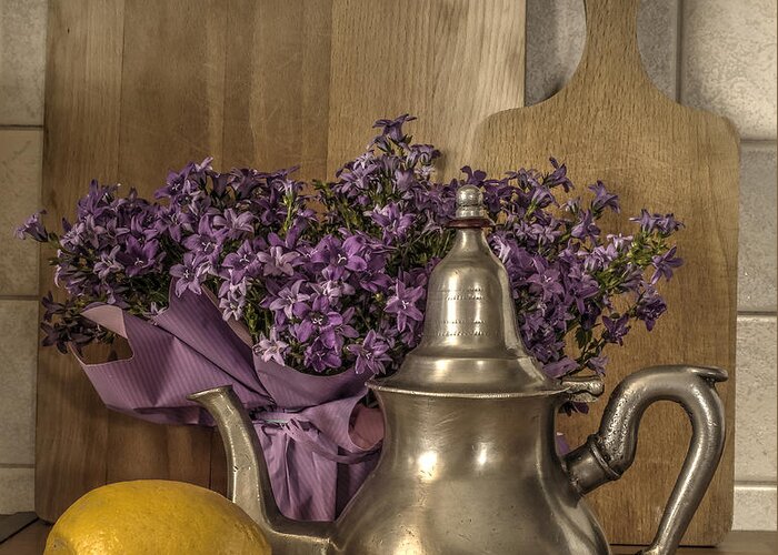 Still Greeting Card featuring the photograph Still Life with Purple Flowers and Citron by Julis Simo