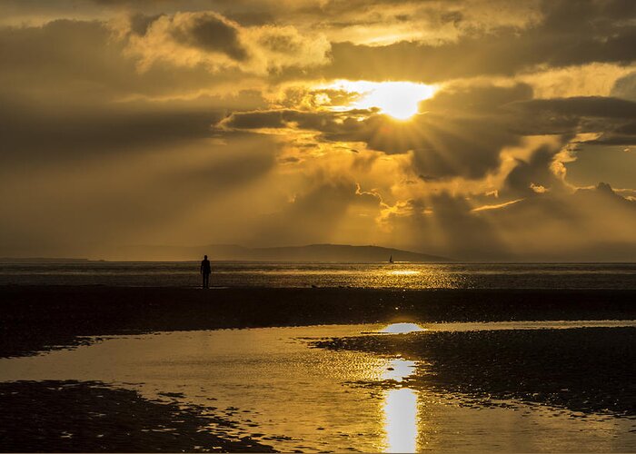 Crosby Beach Greeting Card featuring the photograph Sunbeams through the storm clouds by Paul Madden