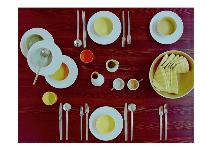 Kitchen Greeting Card featuring the photograph Tableware Set On A Wooden Table by Romulo Yanes