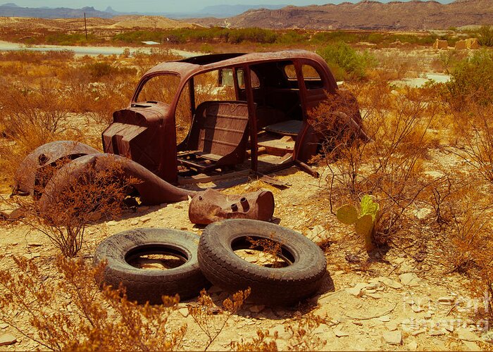 Rusty Car Greeting Card featuring the photograph Terlingua Tires by Sonja Quintero