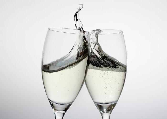 Alcohol Greeting Card featuring the photograph Toasting With Two Glasses Of Champagne by Dual Dual