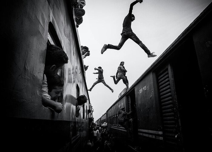 Action Greeting Card featuring the photograph Train Jumpers by Marcel Rebro
