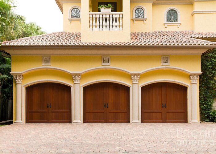 Triple Greeting Card featuring the photograph Triple garage doors by Les Palenik
