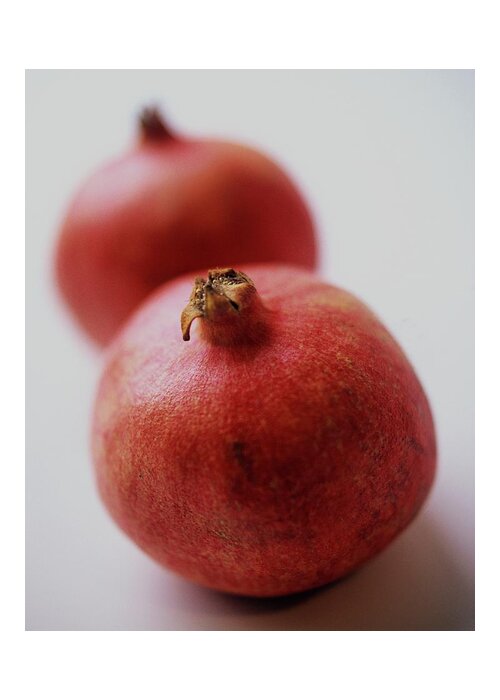 Fruits Greeting Card featuring the photograph Two Pomegranates by Romulo Yanes