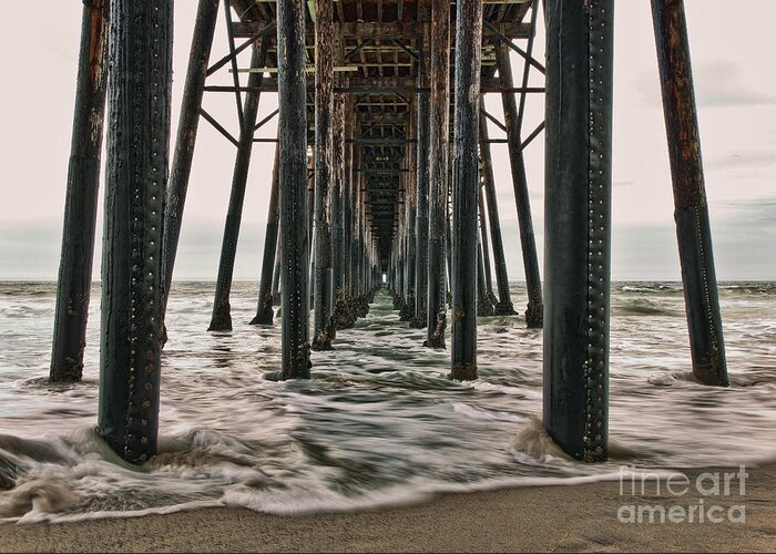Under The Pier Greeting Card featuring the photograph Under The Pier by Eddie Yerkish