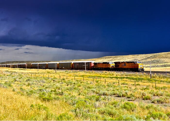 Union Pacific Railroad Greeting Card featuring the photograph Union Pacific Racing a Thunder Storm by Gej Jones